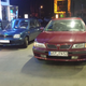 Illustration for article titled Two 90s BMWs at a petrol station.